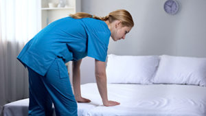 woman doing housekeeping services for senior living home