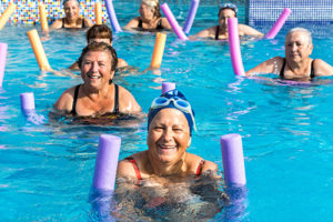 group in pool exercise class