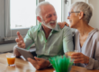 older couple smiling and talking to each other