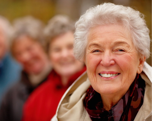 Senior citizen smiling at the camera