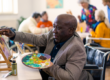 Senior Citizen painting a picture